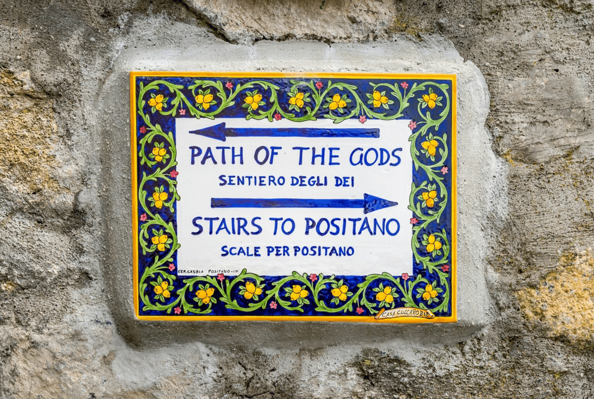 Directional signpost in Nocelle showing the stairs-to-Positano option to avoid